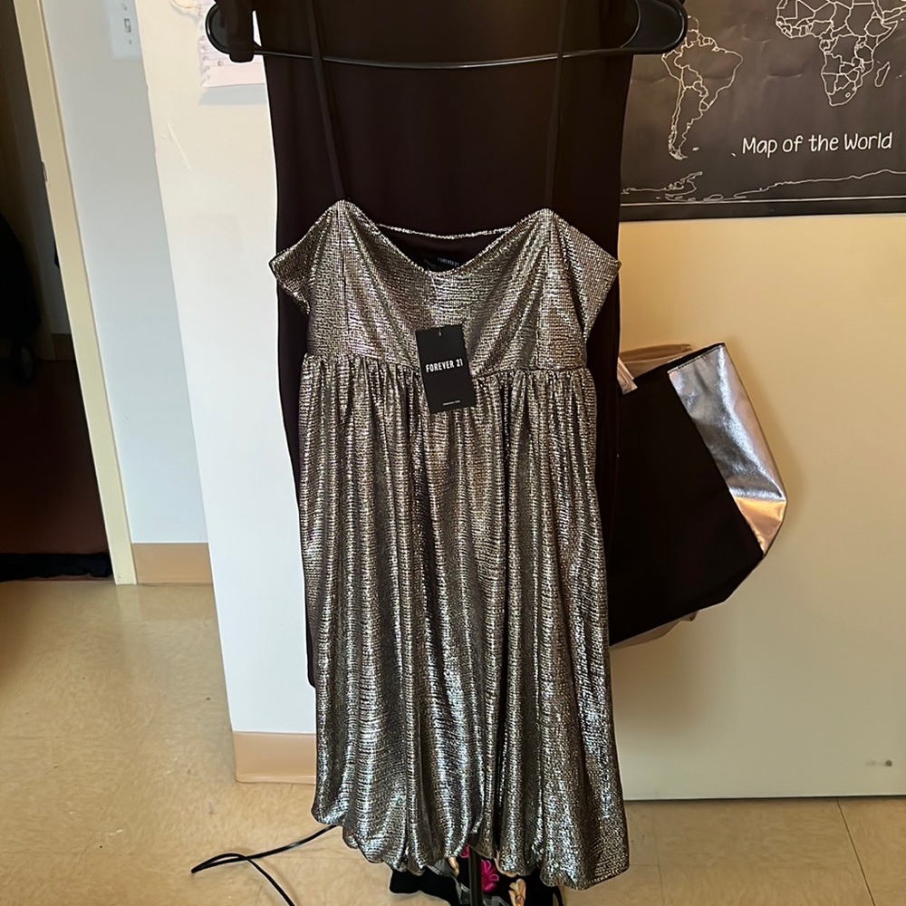 Selling two cute dresses one is black. One gold